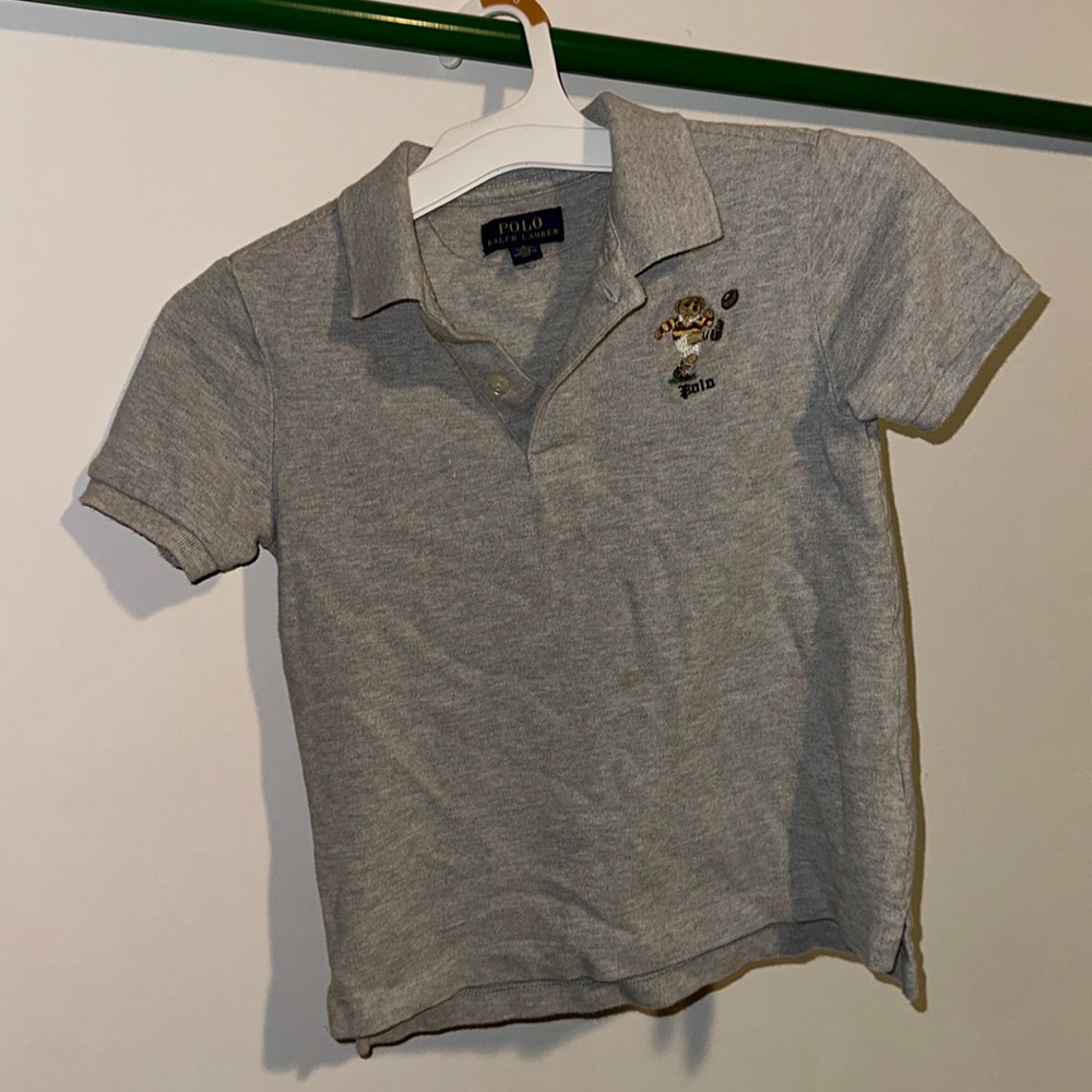 Gray collared Ralph Lauren shirt.